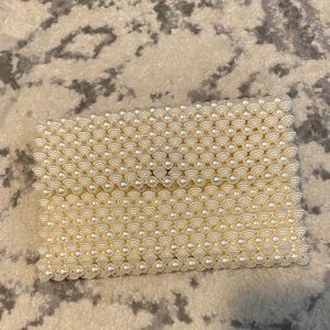 Chic Pearl-Embellished Cream Clutch